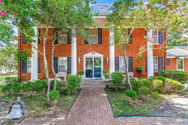 a front view of a multi story residential apartment buildings