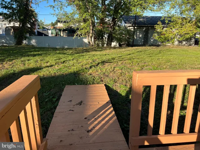 a kitchen with cabinets and window