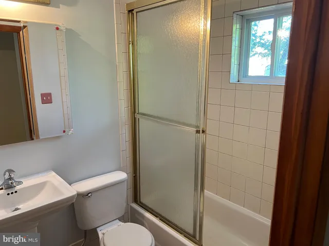 a kitchen with a stove and a cabinet