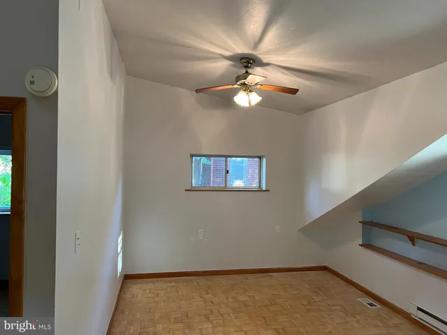 a bathroom with a tub a sink and a toilet