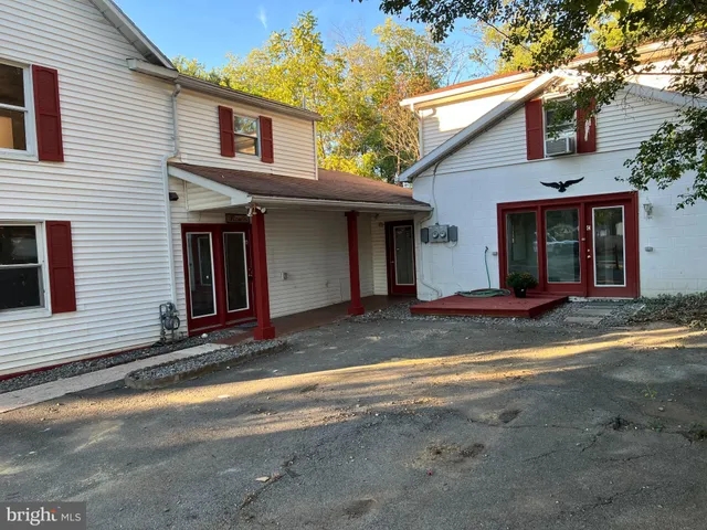 a house with trees in front of it
