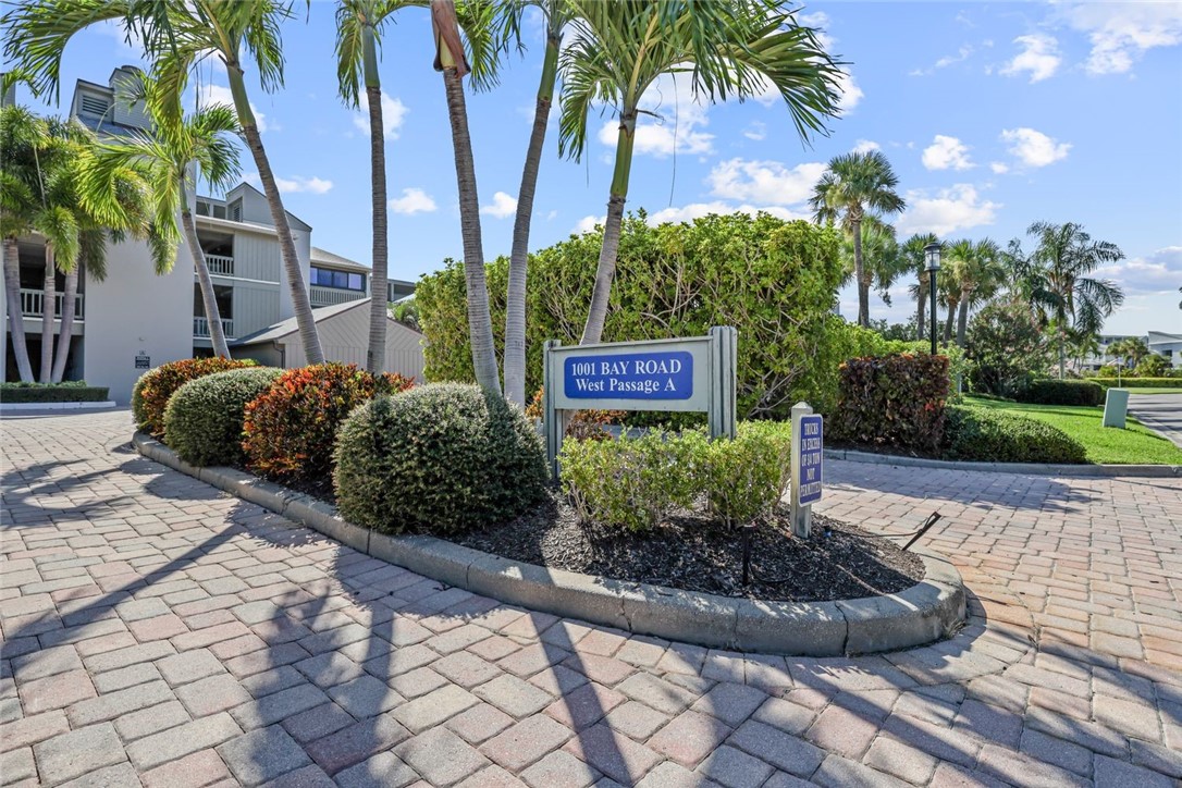 1001 Bay Road, Unit 302 Vero Beach, FL 32963 - Photo 29 of 31 a sign that is sitting in front of a house