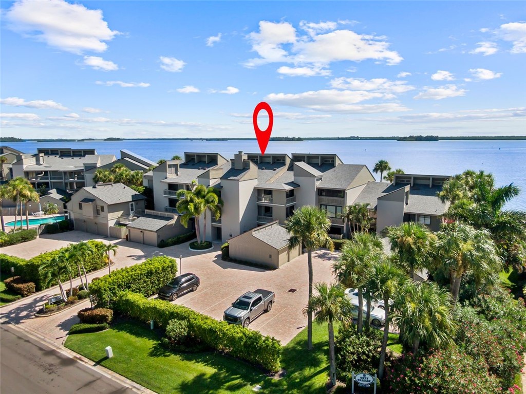 1001 Bay Road, Unit 302 Vero Beach, FL 32963 - Photo 31 of 31 a view of swimming pool patio and outdoor seating
