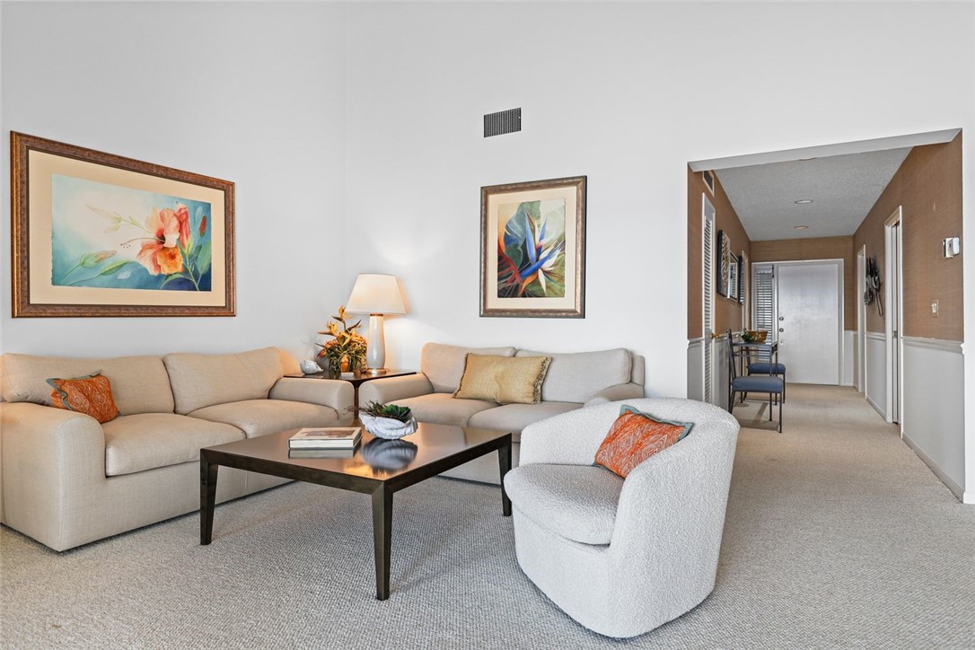 1001 Bay Road, Unit 302 Vero Beach, FL 32963 - Photo 10 of 31 a living room with furniture