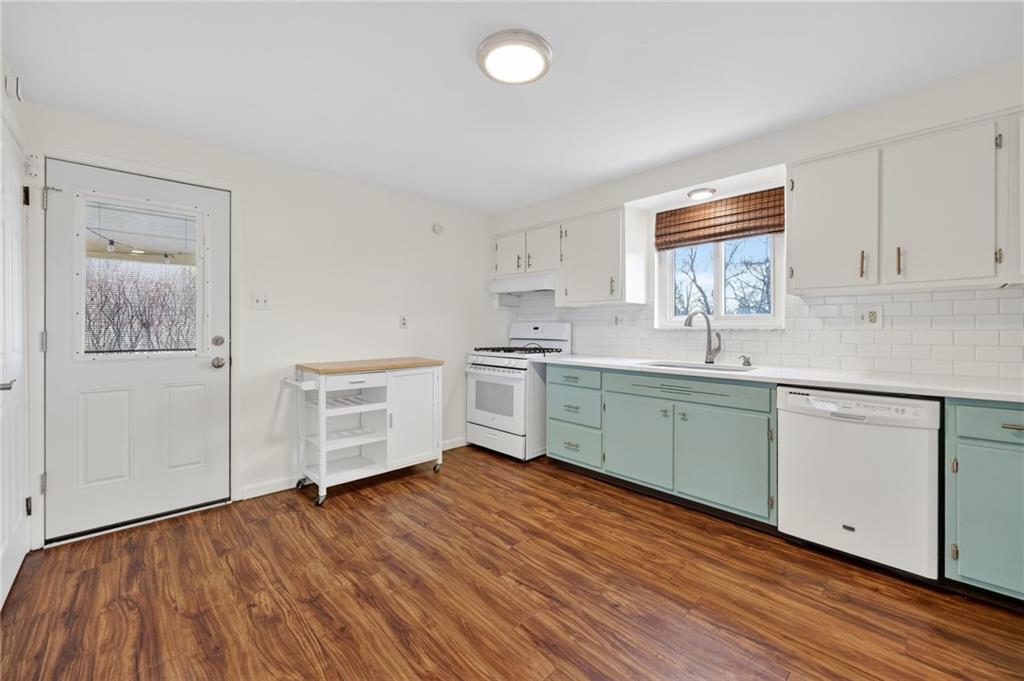 616 Lane Way Pittsburgh, PA 15227 - Photo 12 of 17 a kitchen with a sink cabinets and wooden floor