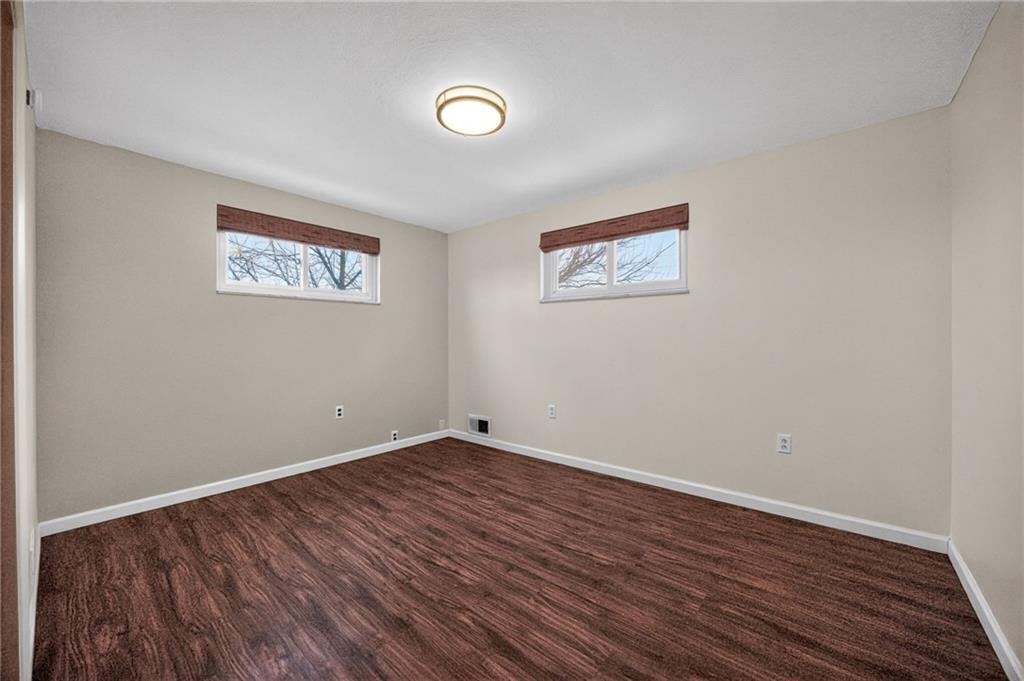616 Lane Way Pittsburgh, PA 15227 - Photo 15 of 17 a view of an empty room with wooden floor