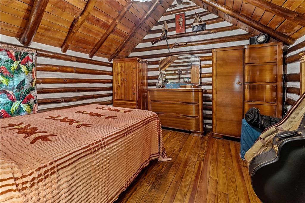 124 New Beaver Creek Road Markleysburg, PA 15459 - Photo 26 of 31 a view of a room with wooden floor