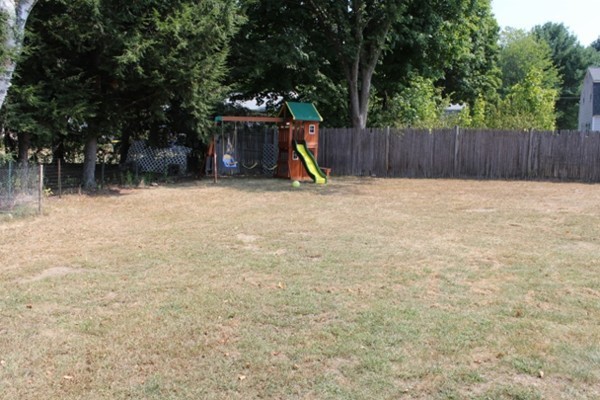3 Palmer Road Pepperell, MA 01463 - Photo 12 of 17 a swimming pool with wooden fence