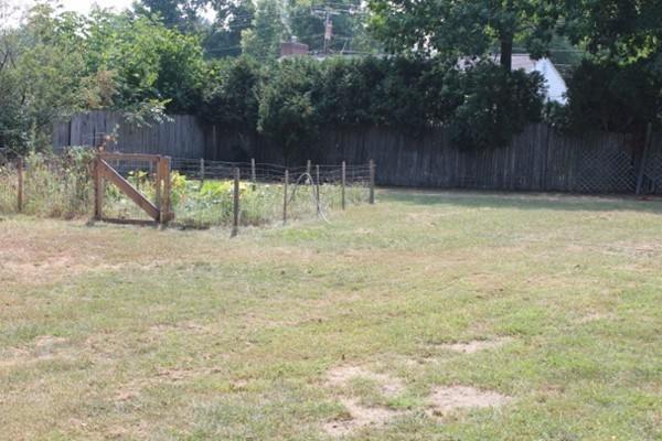 3 Palmer Road Pepperell, MA 01463 - Photo 13 of 17 a view of a backyard with a fence