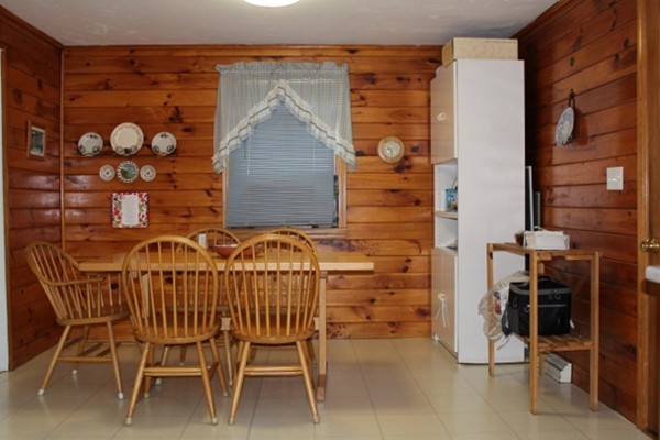 3 Palmer Road Pepperell, MA 01463 - Photo 3 of 17 a backyard of a house with table and chairs