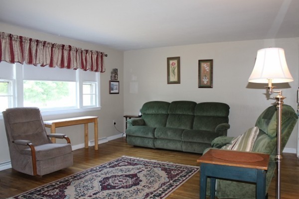 3 Palmer Road Pepperell, MA 01463 - Photo 4 of 17 a living room with furniture and a window