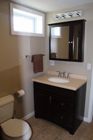3 Palmer Road Pepperell, MA 01463 - Photo 7 of 17 a bathroom with a toilet sink and mirror