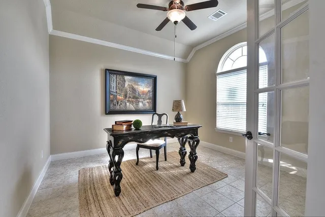a view of a livingroom with furniture window and wooden floor