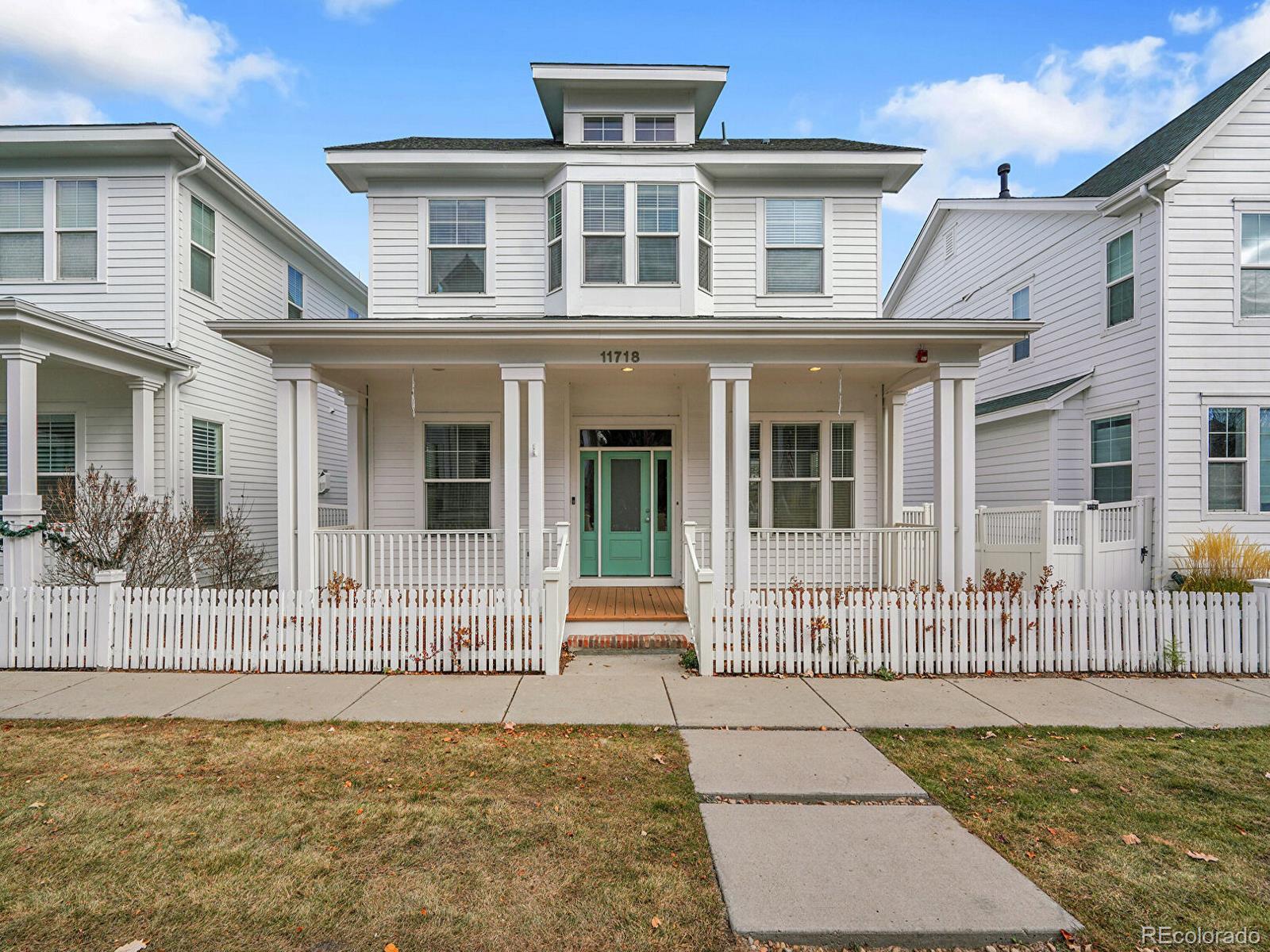 a front view of a house with a balcony