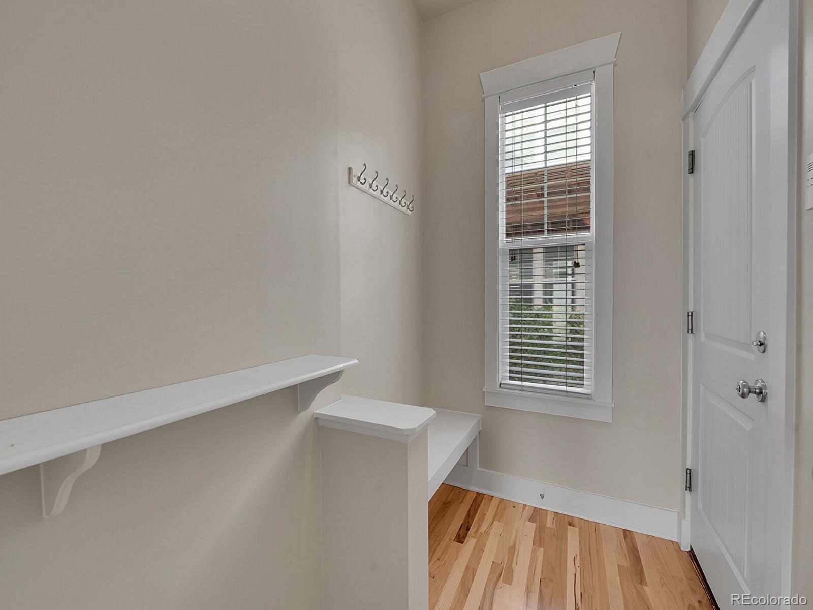 11718 Perry Street Westminster, CO 80031 - Photo 5 of 15 a view of empty room with windows