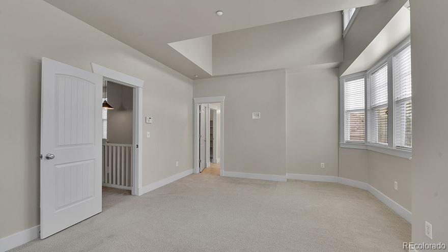 11718 Perry Street Westminster, CO 80031 - Photo 10 of 15 a view of an empty room with a window