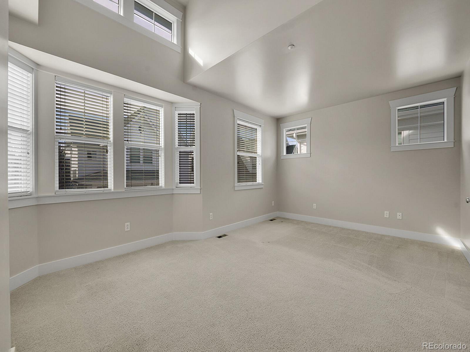 11718 Perry Street Westminster, CO 80031 - Photo 10 of 15 a view of empty room with windows
