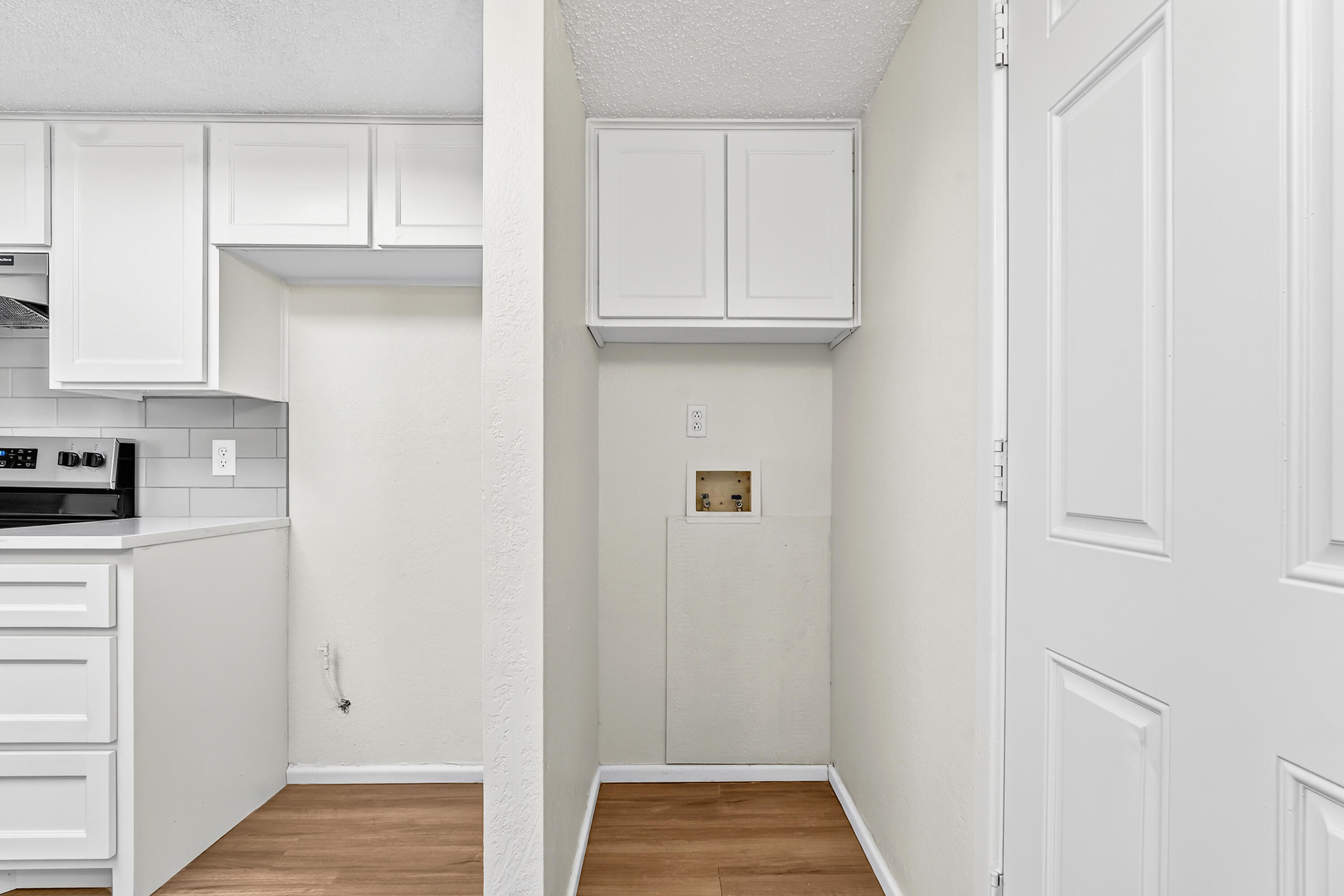 5751 38th Street Lubbock, TX 79407 - Photo 12 of 22 a view of kitchen with white cabinets