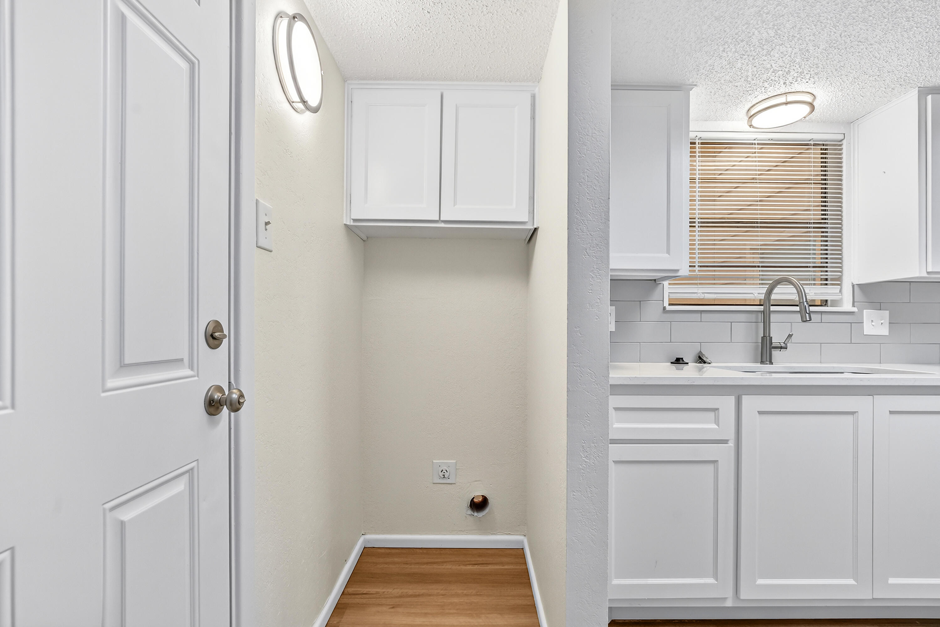 5751 38th Street Lubbock, TX 79407 - Photo 13 of 22 a bathroom with a sink and a mirror