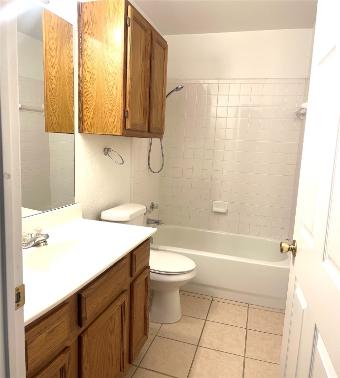 1747 Windy Park Circle Round Rock, TX 78664 - Photo 8 of 12 a bathroom with a sink a toilet and shower
