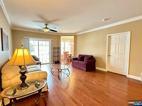 a kitchen with stainless steel appliances granite countertop a refrigerator sink and cabinets