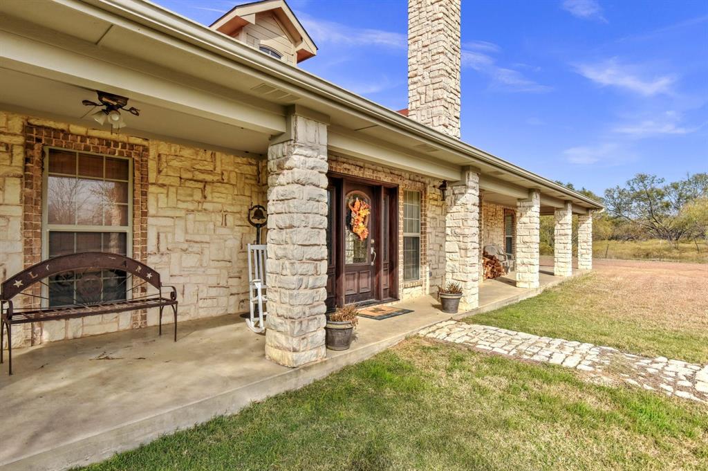 14771 Shearer Road Pilot Point, TX 76258 - Photo 29 of 36 a view of a house with backyard porch and sitting area