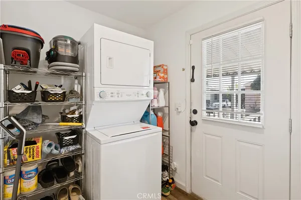 a view of storage and utility room with washer and dryer