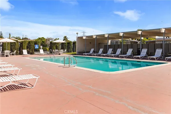 a view of a swimming pool and outdoor space