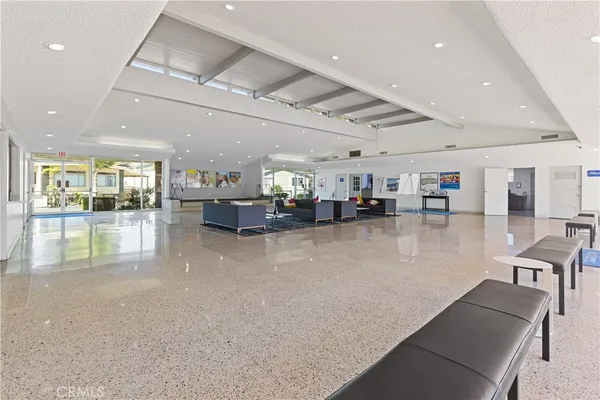 a kitchen with lots of counter space and furniture