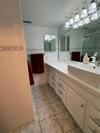 a bathroom with a glass shower