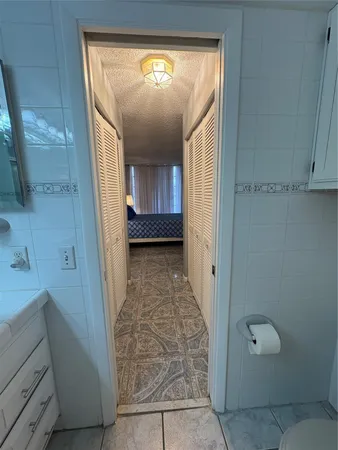 a bench sitting on top of a wooden floor