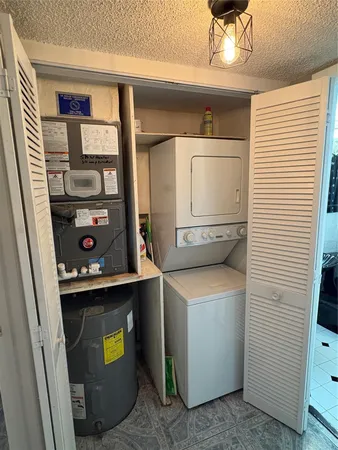 swimming pool view with a seating space