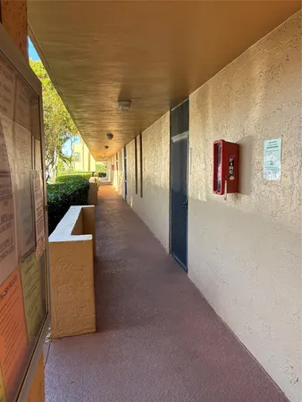 a view of hallway with washer and dryer