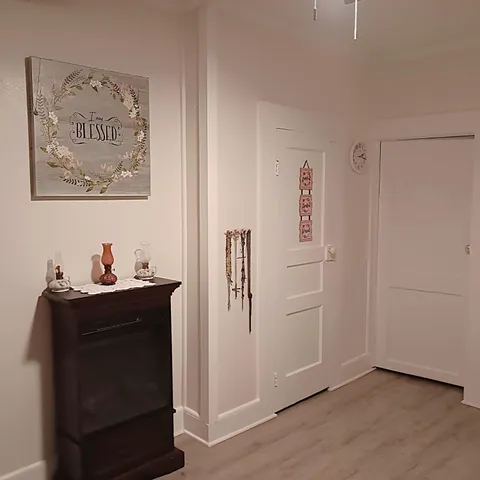 a bathroom with a shower and a sink