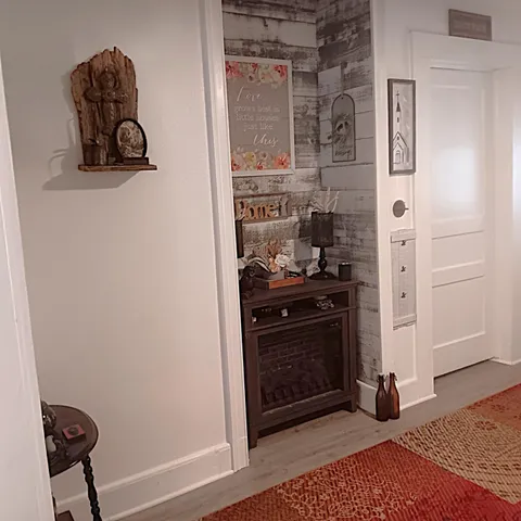a kitchen with a stove and cabinets