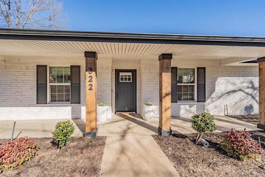 322 Canyon Ridge Drive Richardson, TX 75080 - Photo 2 of 33 a front view of a house