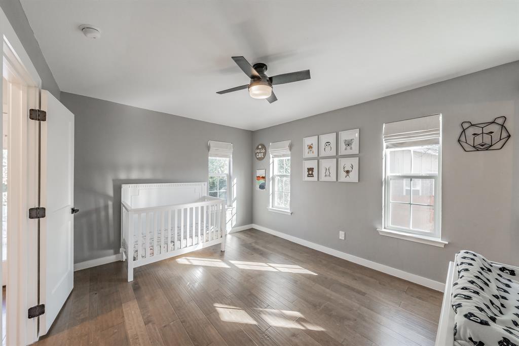 322 Canyon Ridge Drive Richardson, TX 75080 - Photo 23 of 33 a view of livingroom with hardwood floor and a ceiling fan