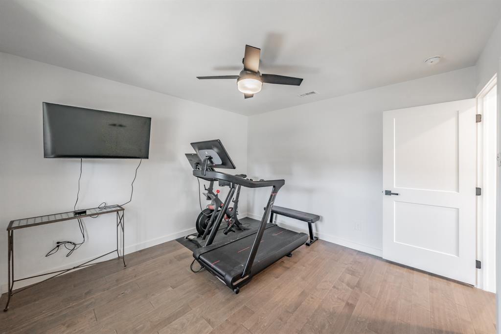 322 Canyon Ridge Drive Richardson, TX 75080 - Photo 27 of 33 a view of a workspace with furniture and a window