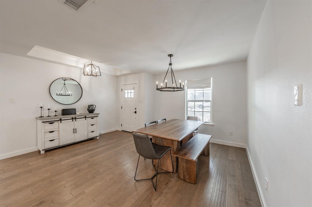 322 Canyon Ridge Drive Richardson, TX 75080 - Photo 6 of 33 a view of a room and windows
