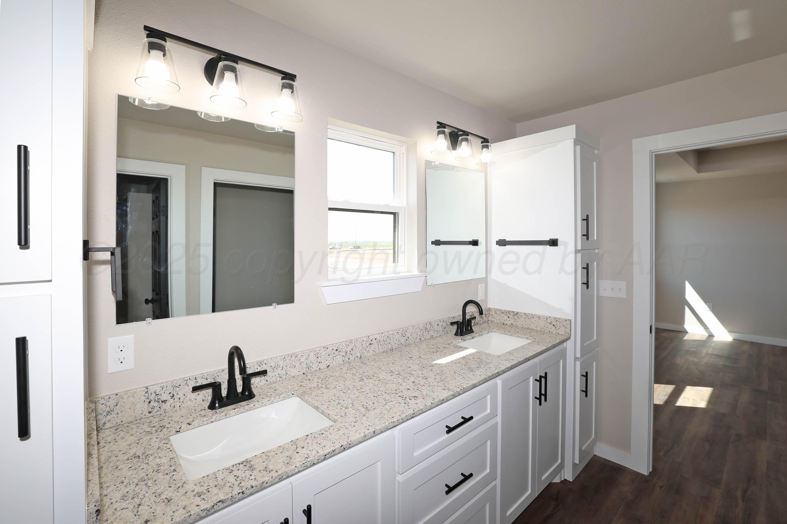 4010 Clive Avenue Amarillo, TX 79118 - Photo 28 of 41 28-Primary Bath Vanity