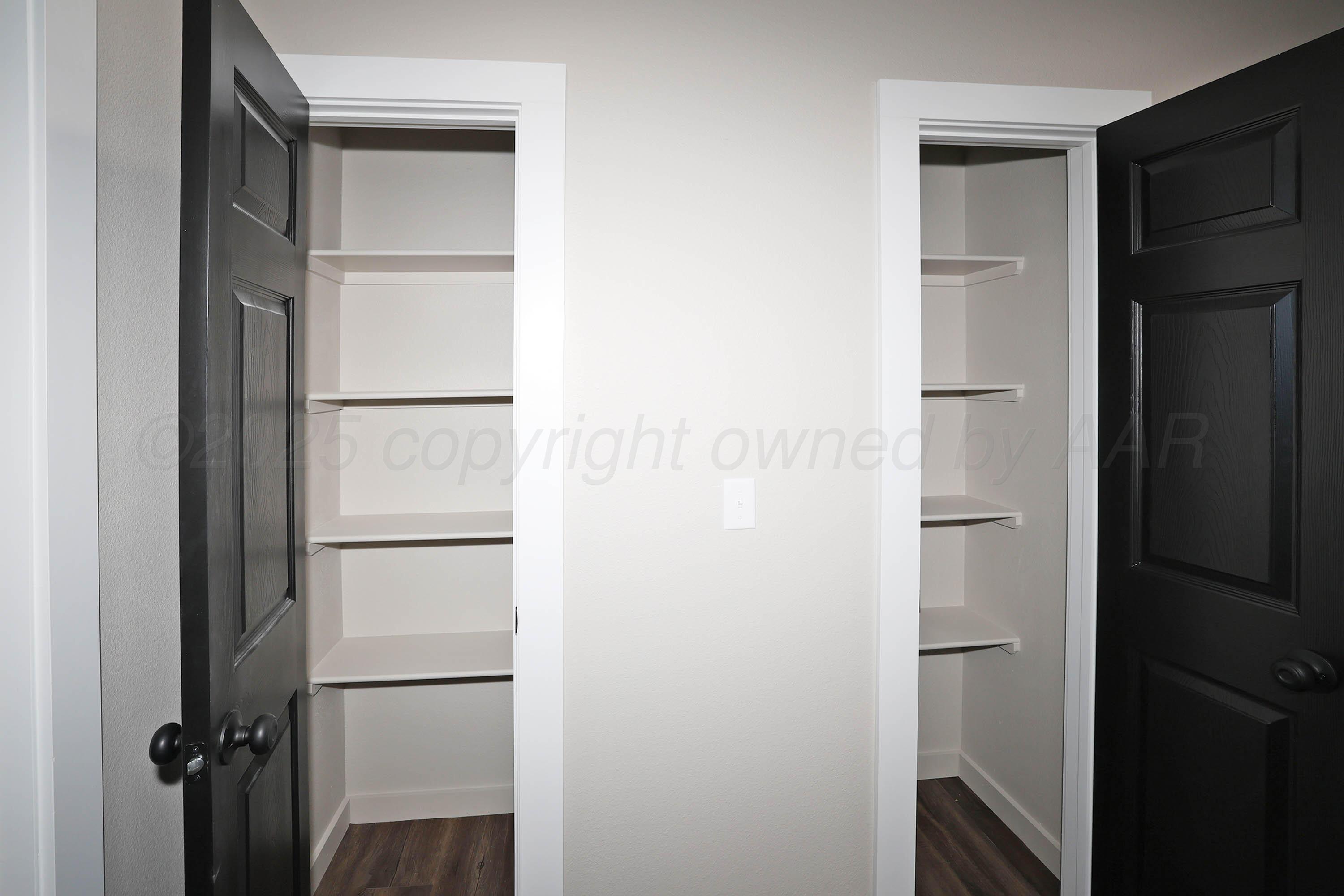 4010 Clive Avenue Amarillo, TX 79118 - Photo 36 of 41 36-Number 1-Upstairs Linen Closets