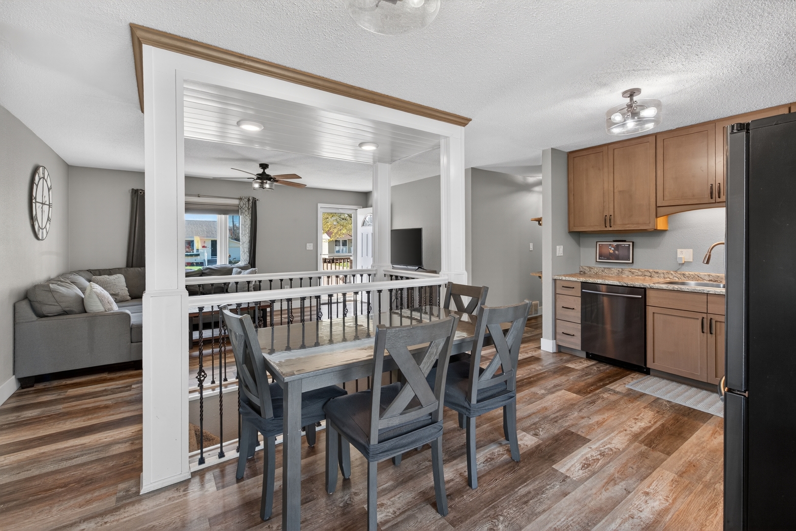 602 14th Place Camanche, IA 52730 - Photo 15 of 23 a view of a dining room with furniture and wooden floor