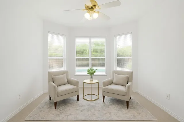 a bedroom with bed and a chandelier