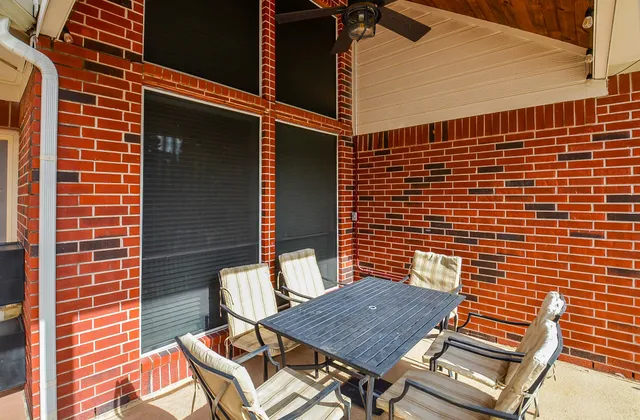 a bed room with a bed and a chandelier