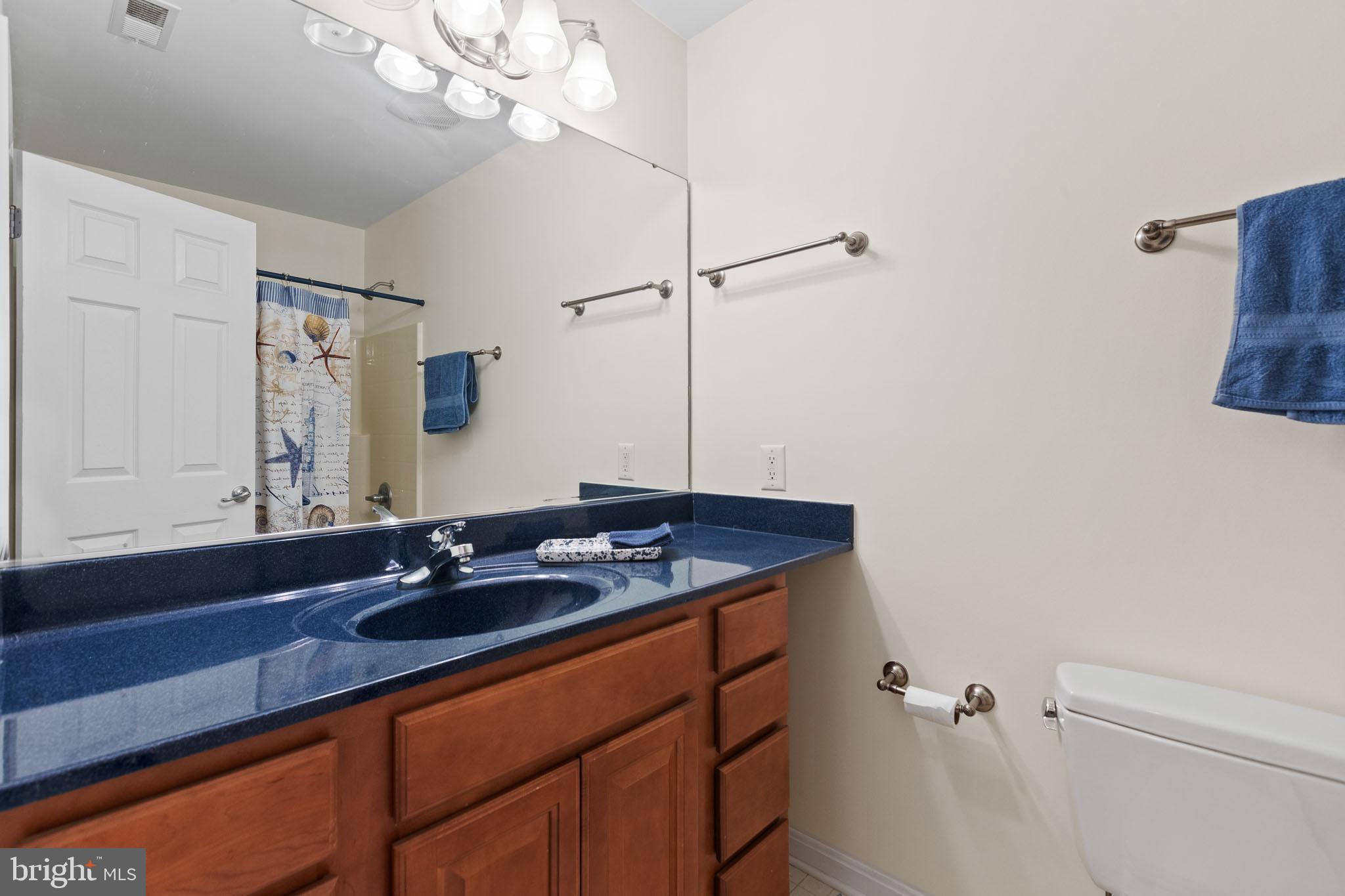 16405 Fishermen Way Ridge, MD 20680 - Photo 36 of 61 Upper Level Full Bath Outside Bedroom 3