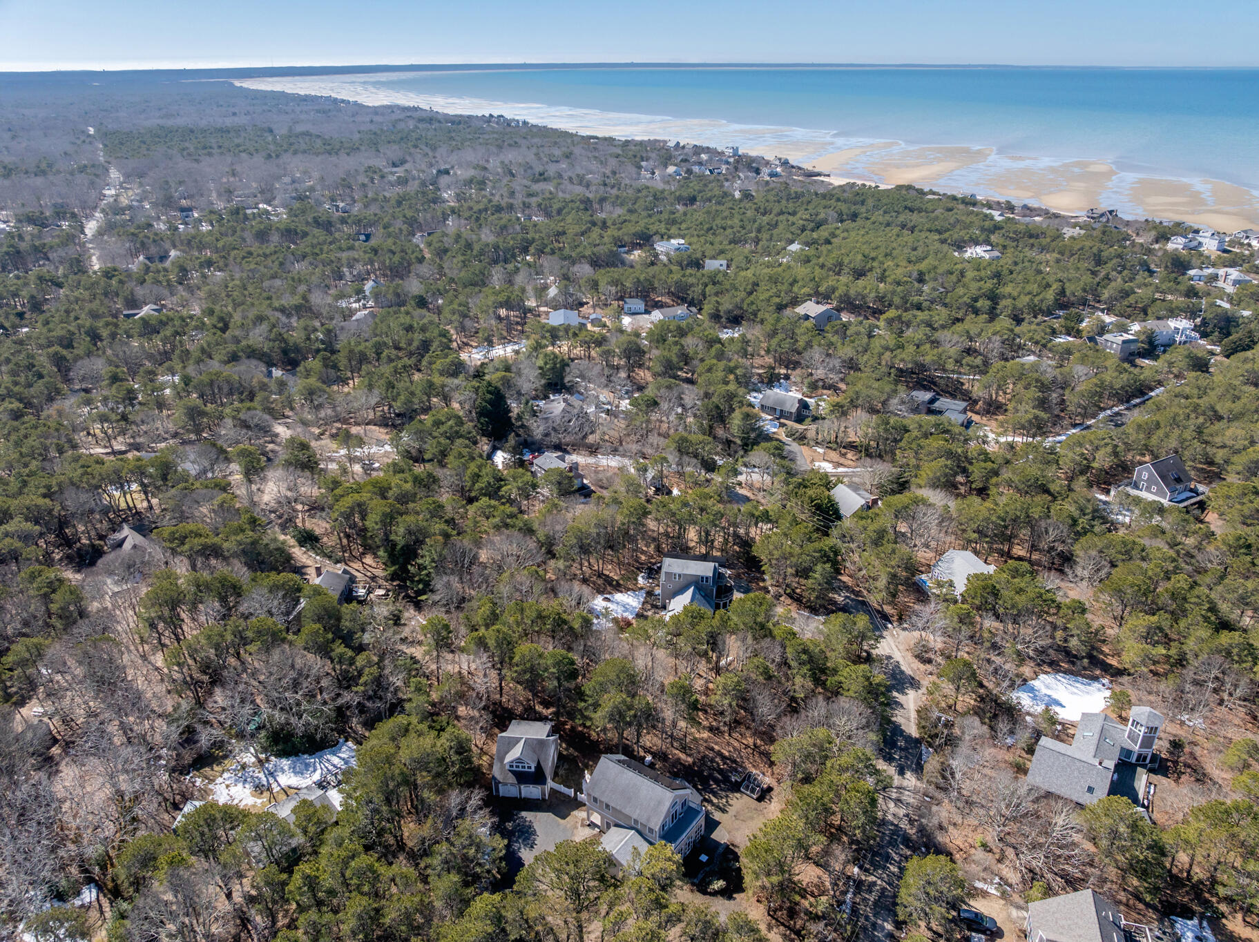 311 South Sunken Meadow Road Eastham, MA 02642 - Photo 50 of 57 an aerial view of house with yard and mountain view in back