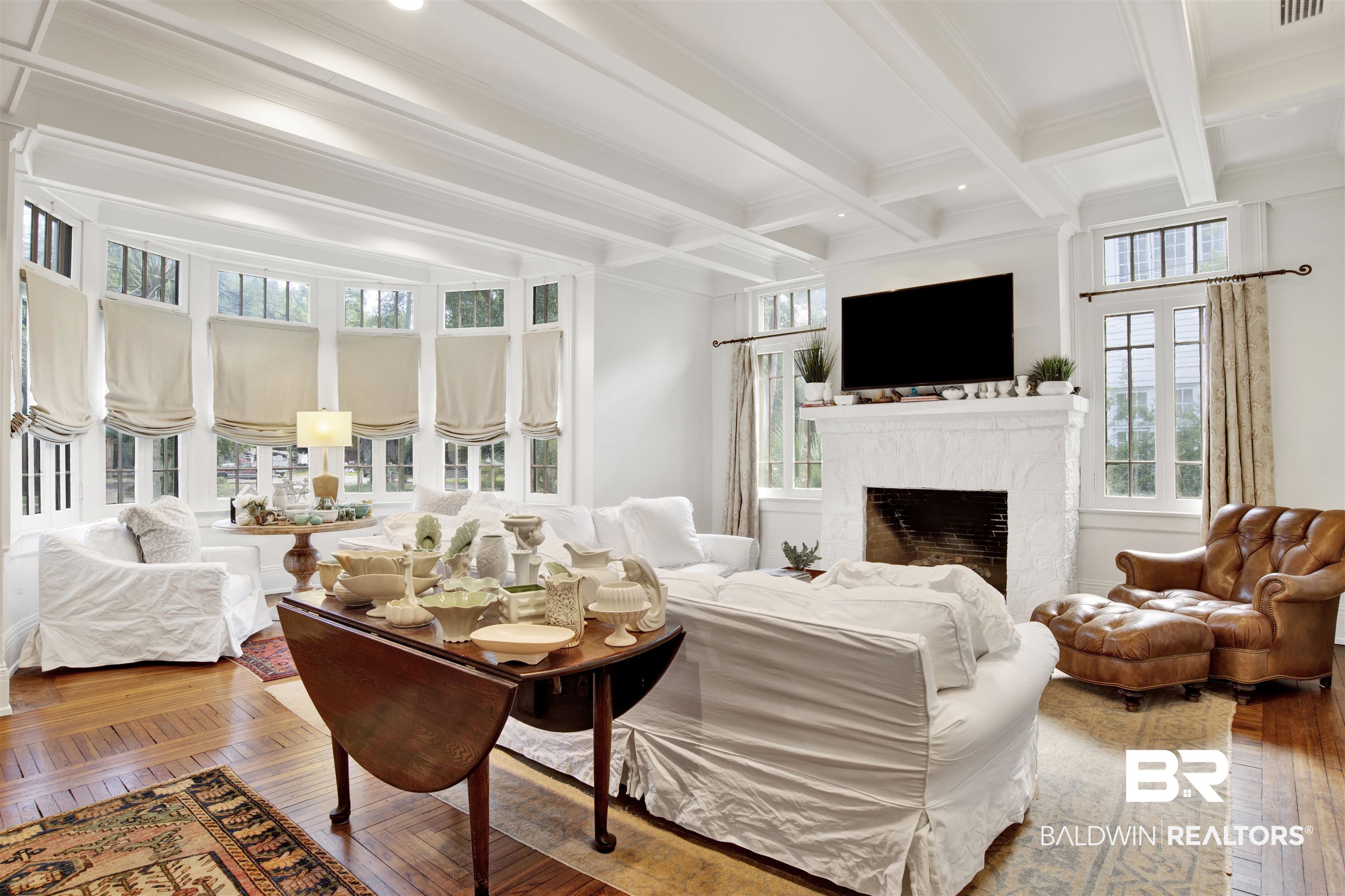 1654 Government Street Mobile, AL 36604 - Photo 12 of 45 Living room with beam ceiling and a healthy amount of sunlight