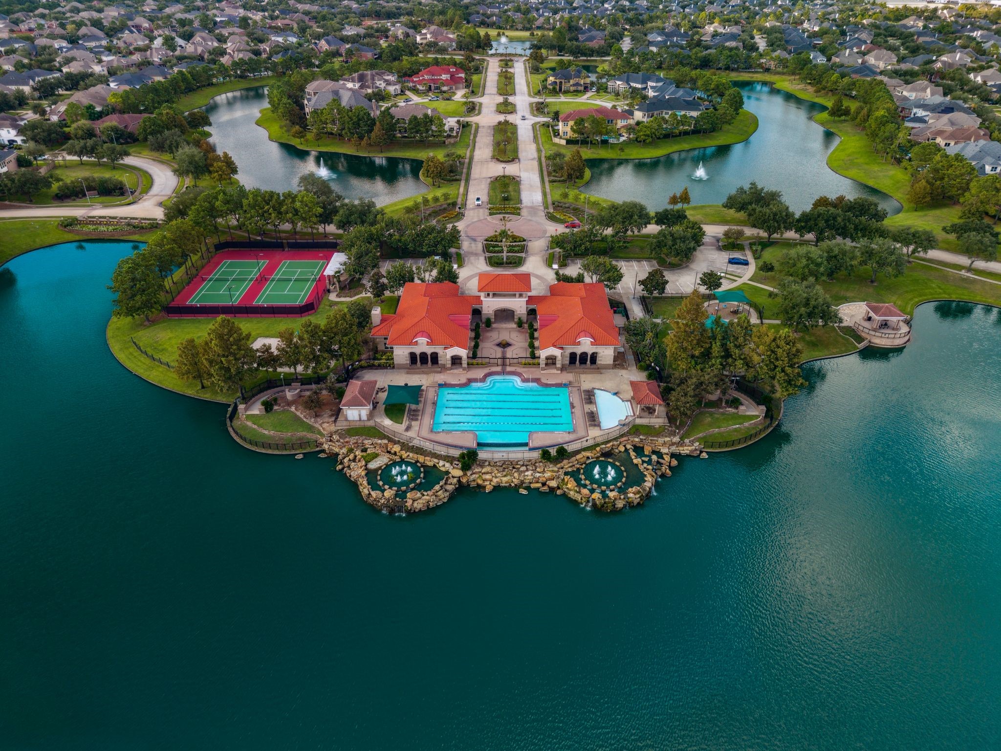 6211 Alameda Point Lane Houston, TX 77041 - Photo 50 of 50 Experience a premier resort-style lifestyle in a secure, manned-gate community boasting a clubhouse, fitness center, lighted tennis and pickleball courts, sand volleyball, dual pools, and miles of scenic trails and playgrounds.