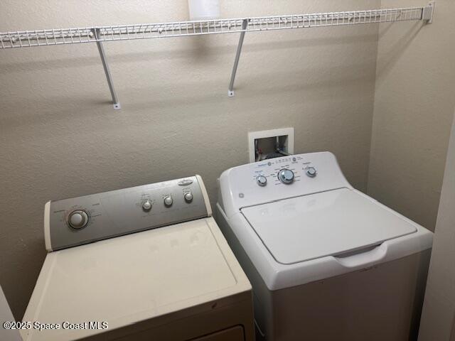 3718 Chambers Lane, Unit 2 Cocoa, FL 32926 - Photo 12 of 20 a utility room with dryer and washer