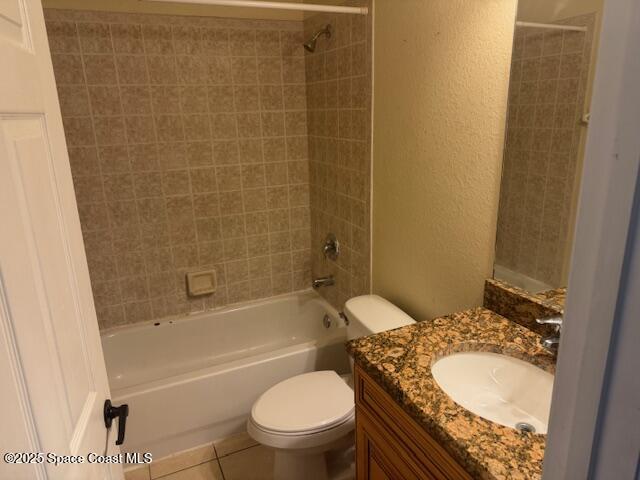 3718 Chambers Lane, Unit 2 Cocoa, FL 32926 - Photo 13 of 20 a bathroom with a granite countertop toilet sink and shower
